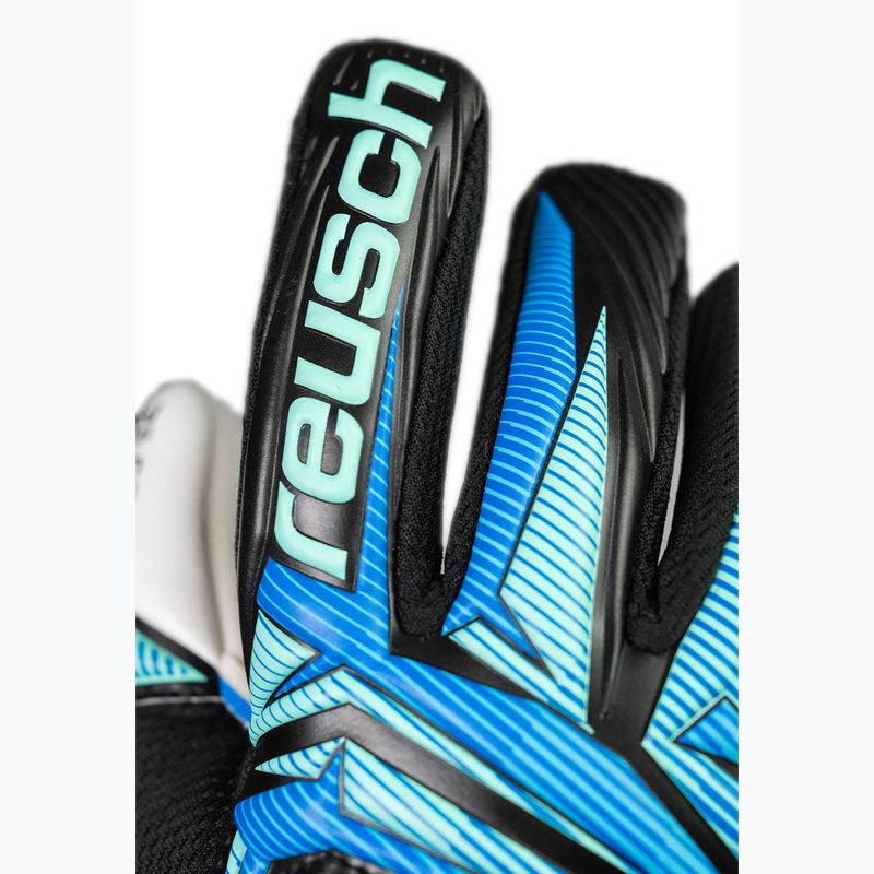 Children's goalkeeper gloves Reusch Attrakt RE:GRIP NC Junior black/ocean light 6