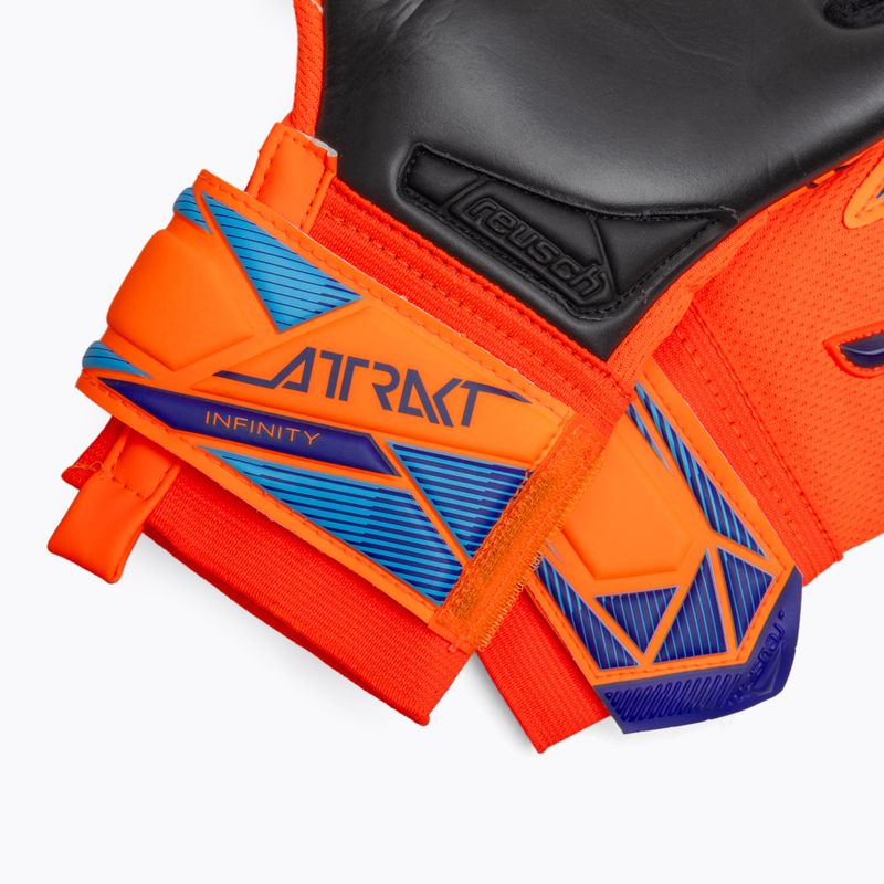 Children's goalkeeper gloves Reusch Attrakt Infinity Evolution NC Junior shocking orange/blue/black 5