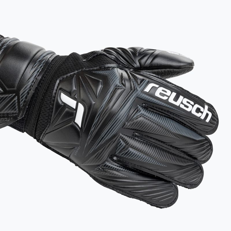 Children's goalkeeper gloves Reusch Attrakt Resist 5672615 black 5