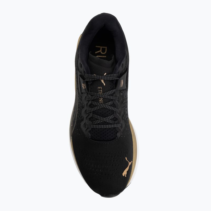 Women's running shoes Puma Eternity Nitro black/gold/white 5