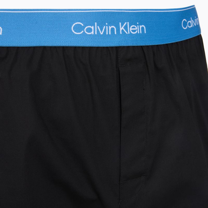 Men's boxers Calvin Klein LV00NB4267 Boxer Slim black bodies w/ poseidon blue/plein 6