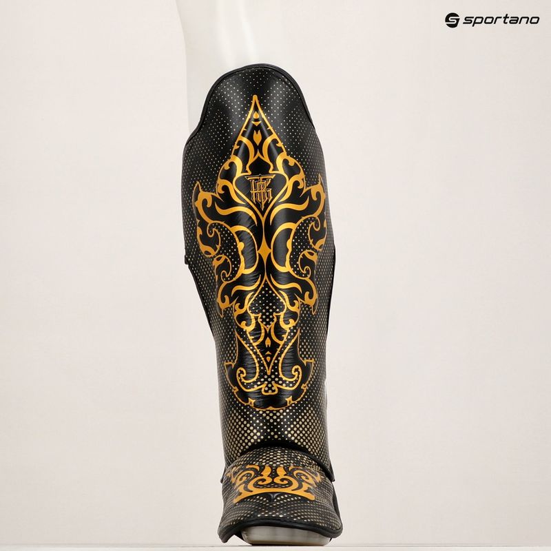 Top King Kanok black tibia and foot protectors 9